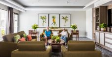 Arcare aged care pimpama lounge with two residents